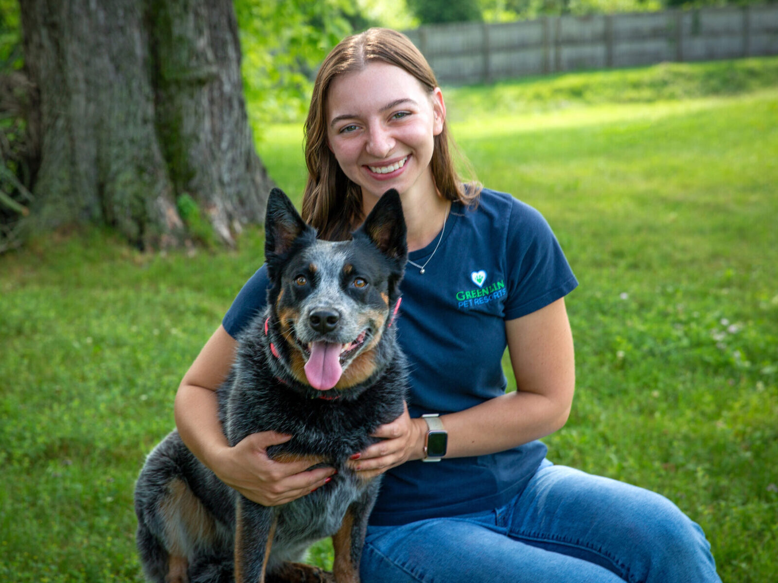 Portrait of Maddi B., General Manager at Greenlin Pet Resorts in Camp Hill, smiling and wearing professional attire.